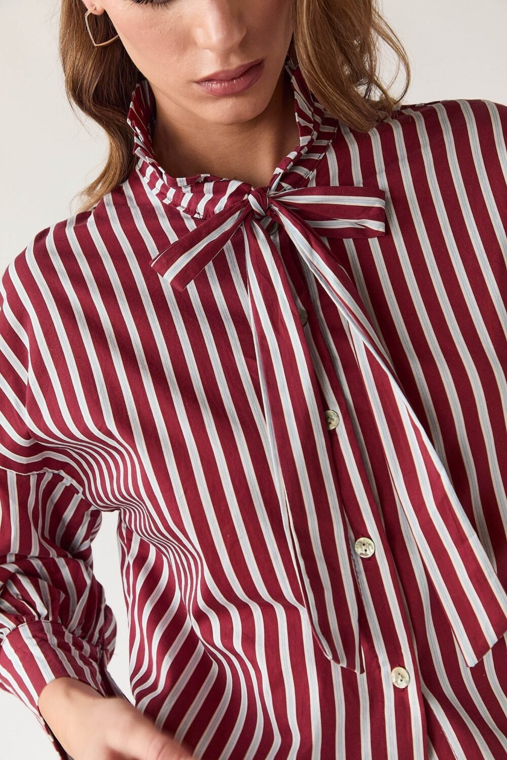 Blusa lazo rayas manga abullonada vino