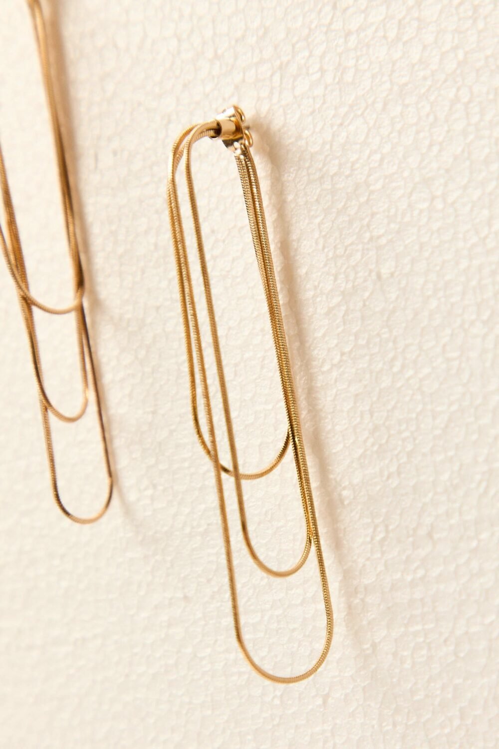 Pendiente dorado cascada