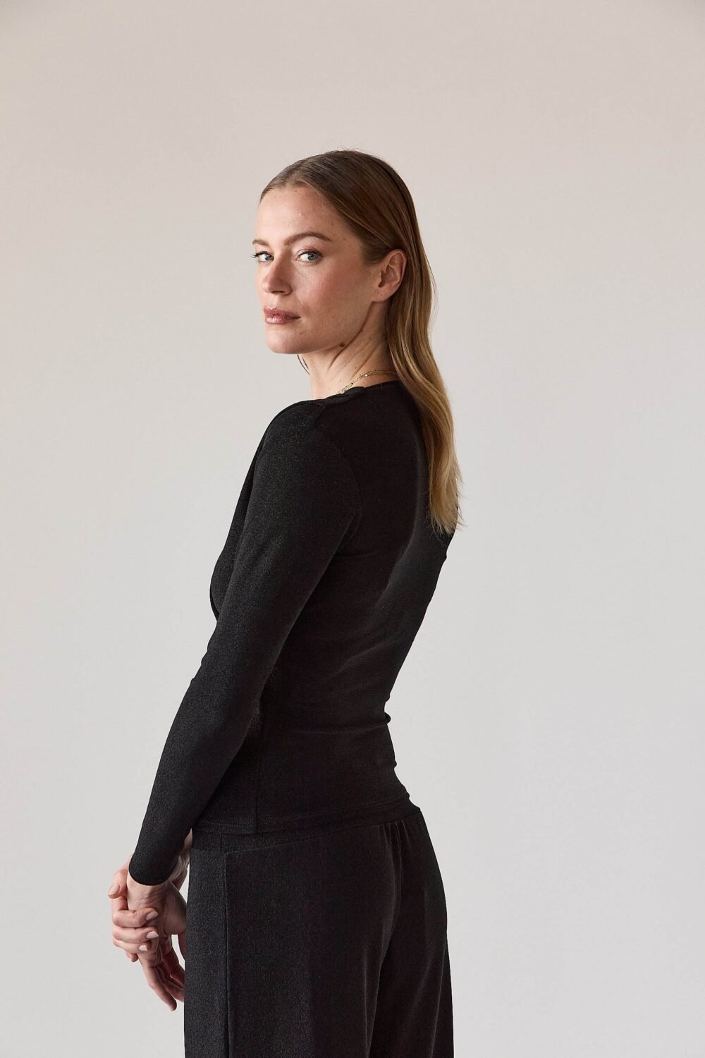 Top cruzado lurex hebilla negro